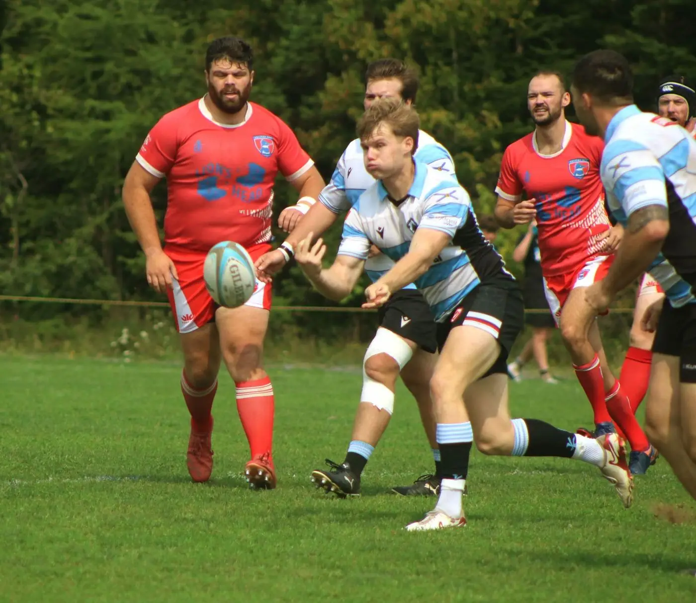 A Tars player firing out a pass