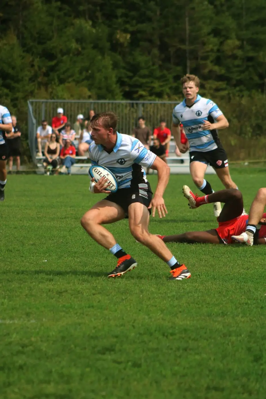A Tars player running the ball back