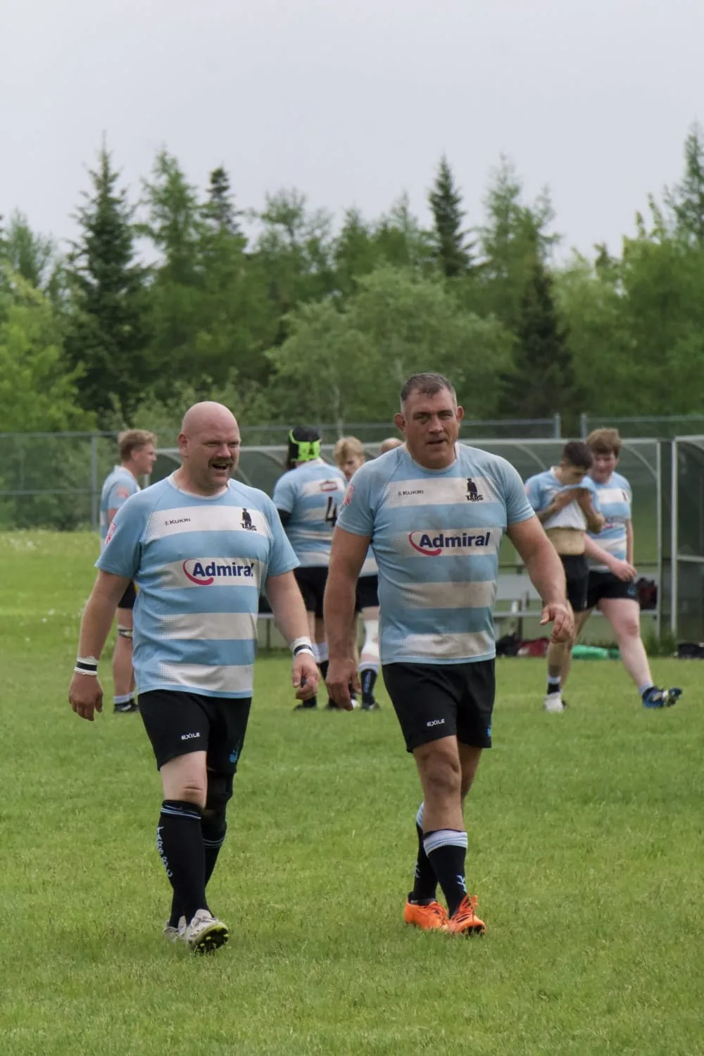 Two Tars Division 2 players walking out on the pitch