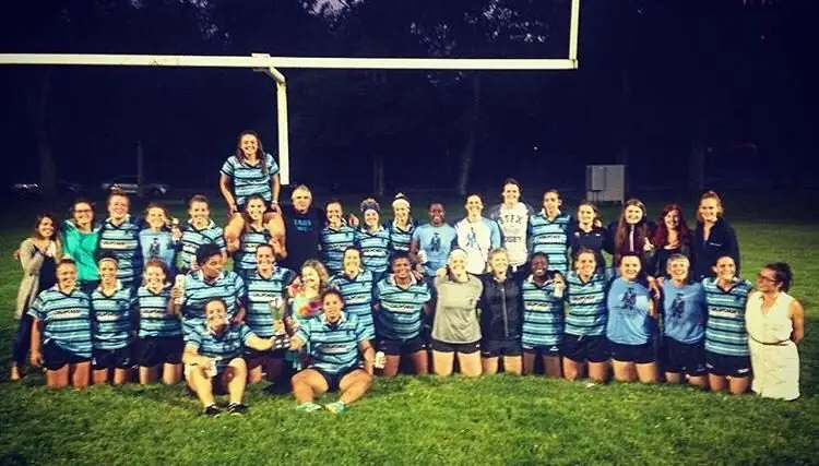 A Tars club squad photo under the posts